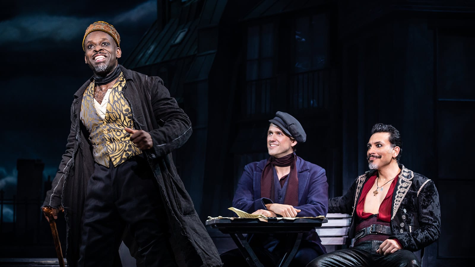 Sahr Ngaujah as Toulouse-Lautrec, Aaron Tveit as Christian and Ricky Rojas as Santiago